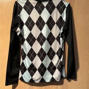 Long sleeve polyester and spandex top.
